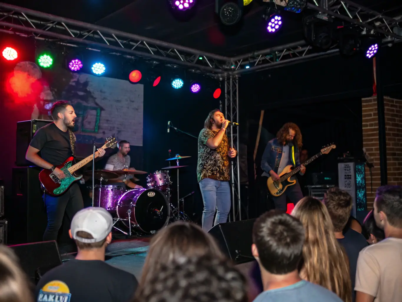 A captivating image of a concert performance at VALLEE, featuring talented musicians on stage and an enthusiastic audience enjoying the show.
